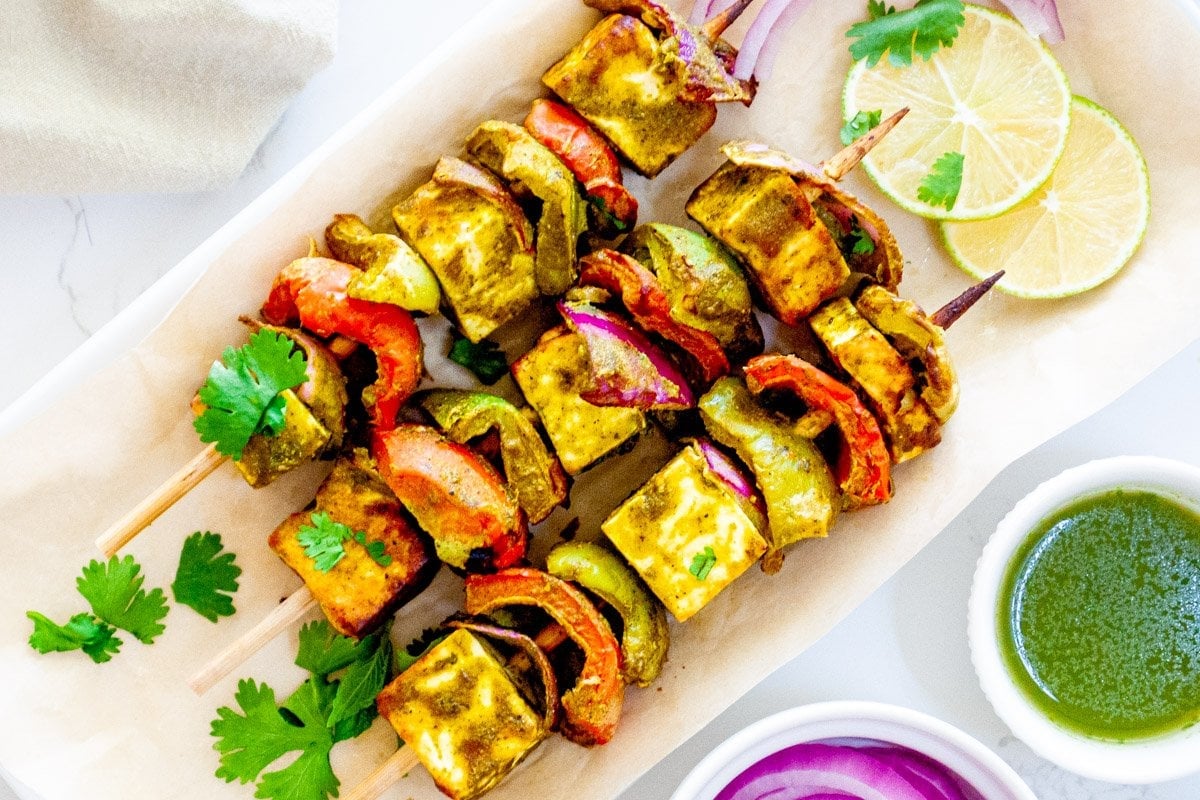 Hariyali Green Paneer Tikka served with lime and green chutney