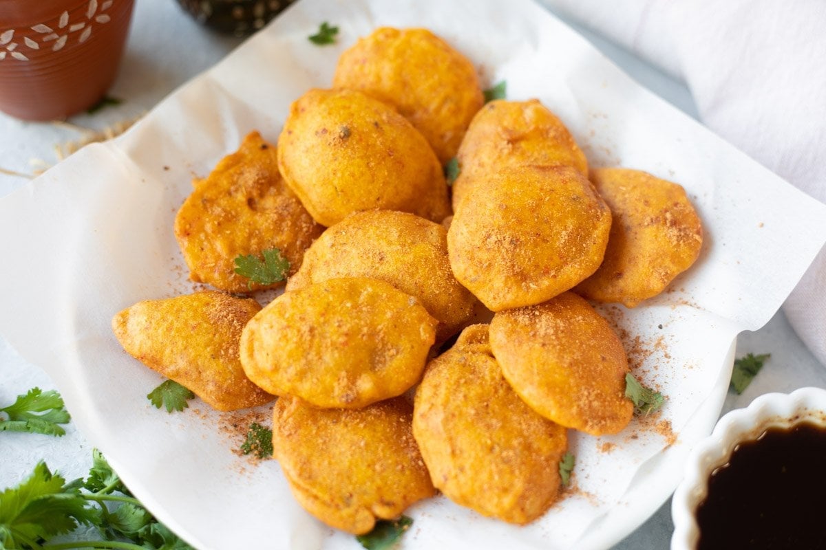 Aloo pakora with tea and chutney on the side