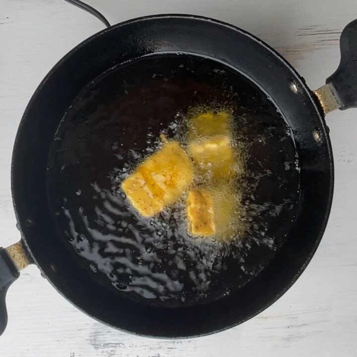 Dipping Square Paneer in oil