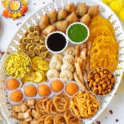 desi charcuterie board for Diwali or Ramadan with a variety of snacks and sweets