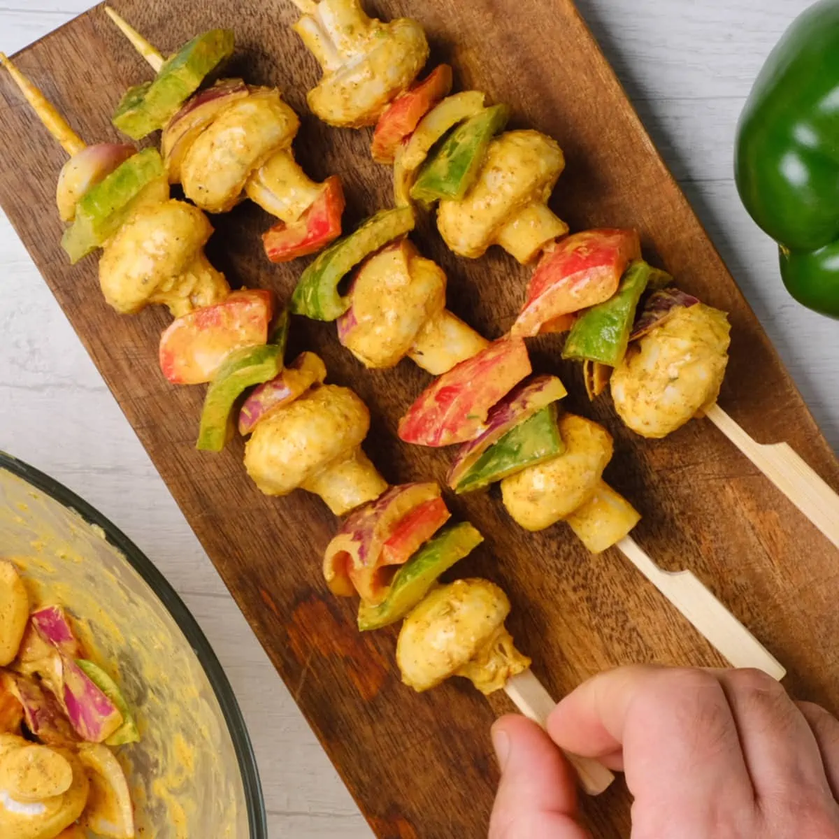 Threaded Mushroom Tikka on a wooden board