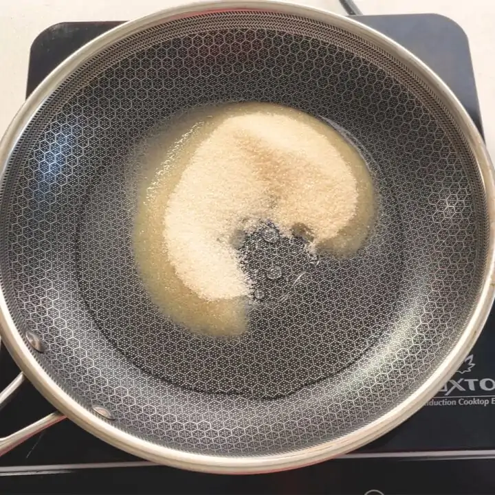 Add Water and sugar to the pan