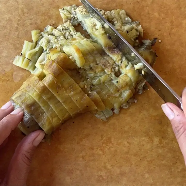 chop eggplant with a knife
