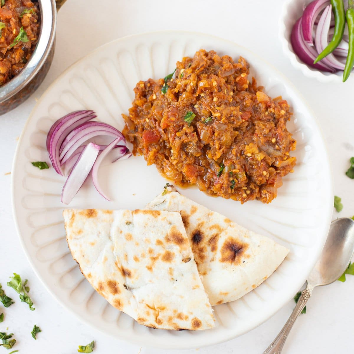 Baingan Bharta served in a white plate