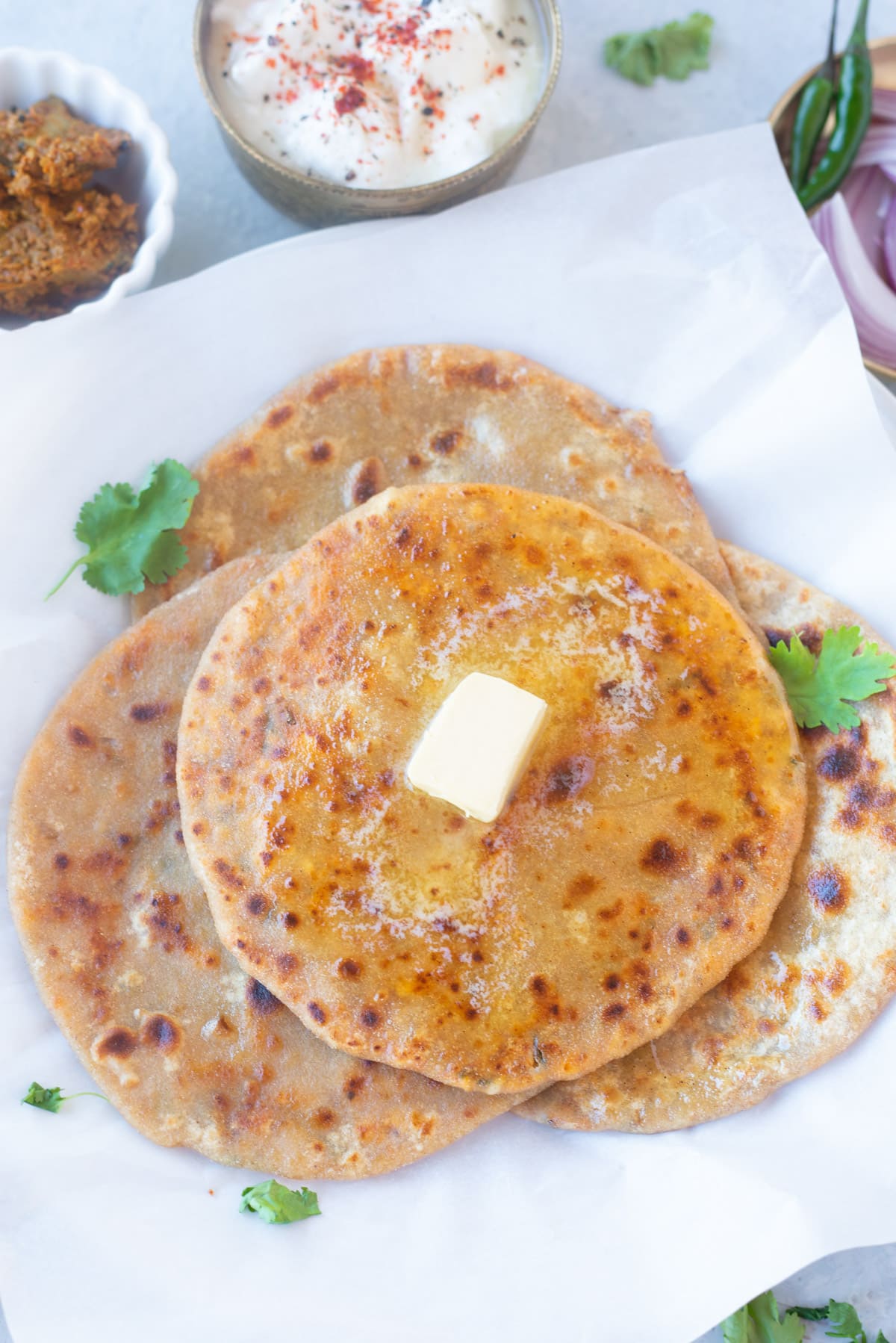 Piping hot paneer paratha in a plate
