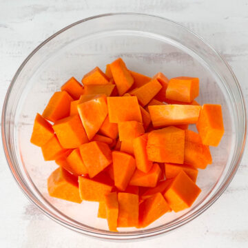 in a glass bowl add diced pumpkins