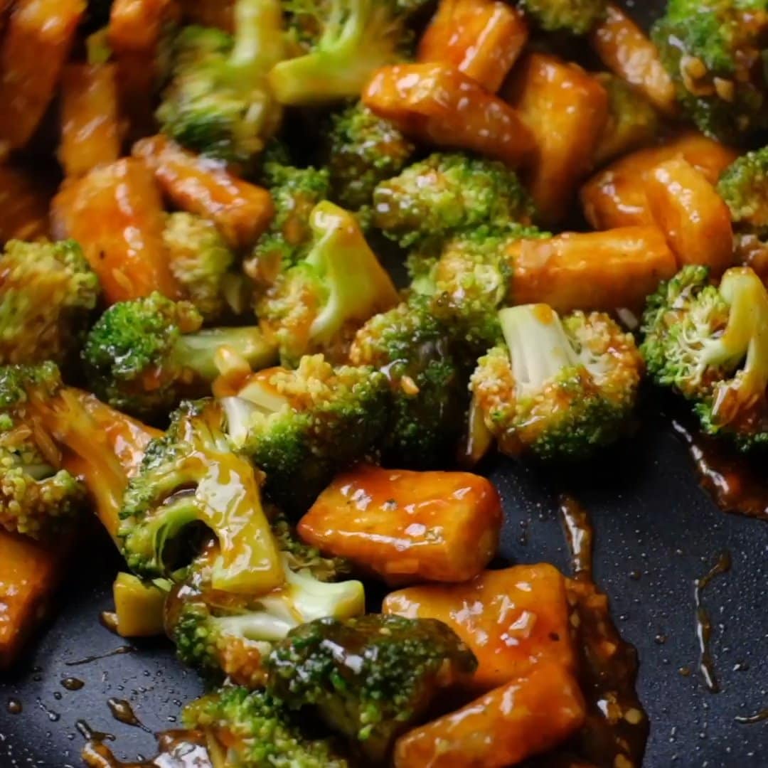 Mix sauce in veggies for Tofu Broccoli Stir Fry