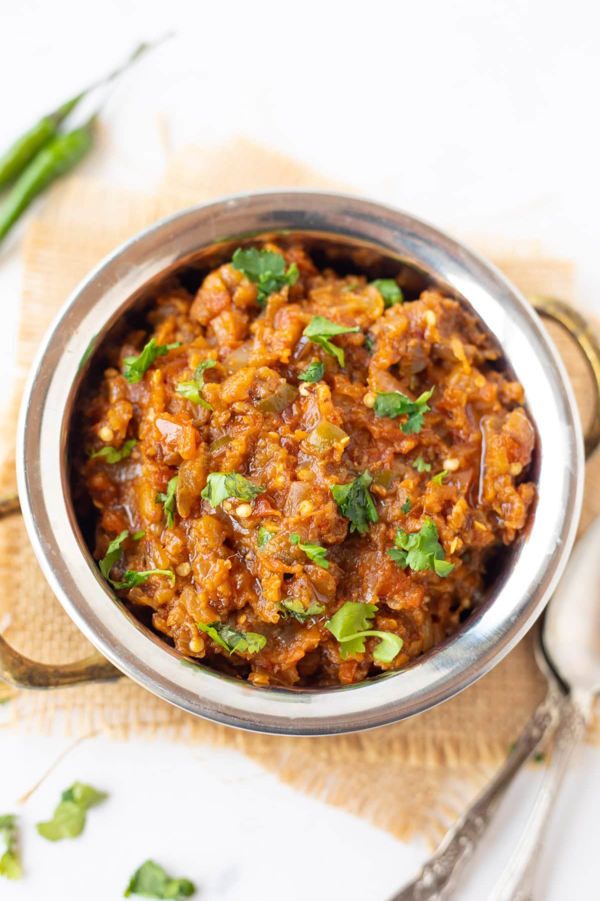 indian dish with eggplant in serving bowl