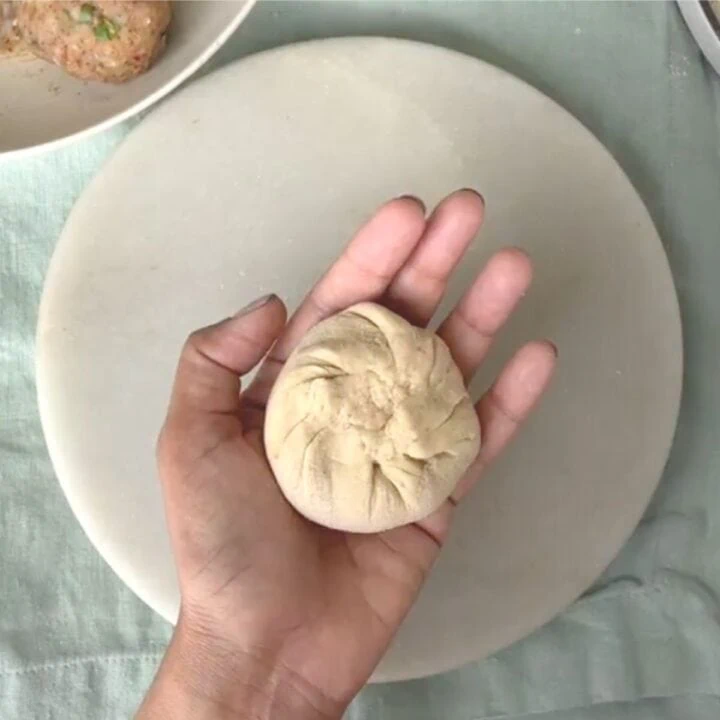 pleated dough to make aloo paratha