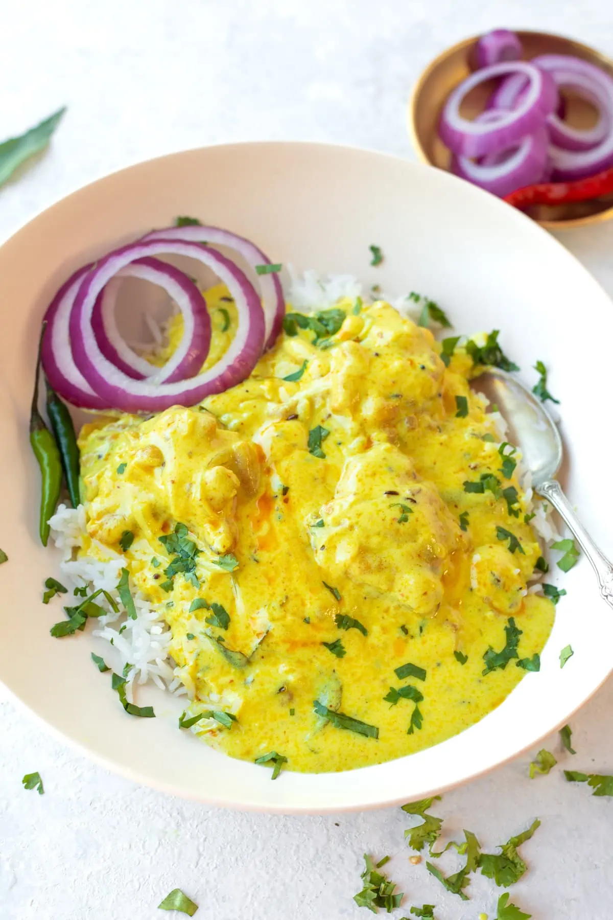 kadhi chawal in a plate