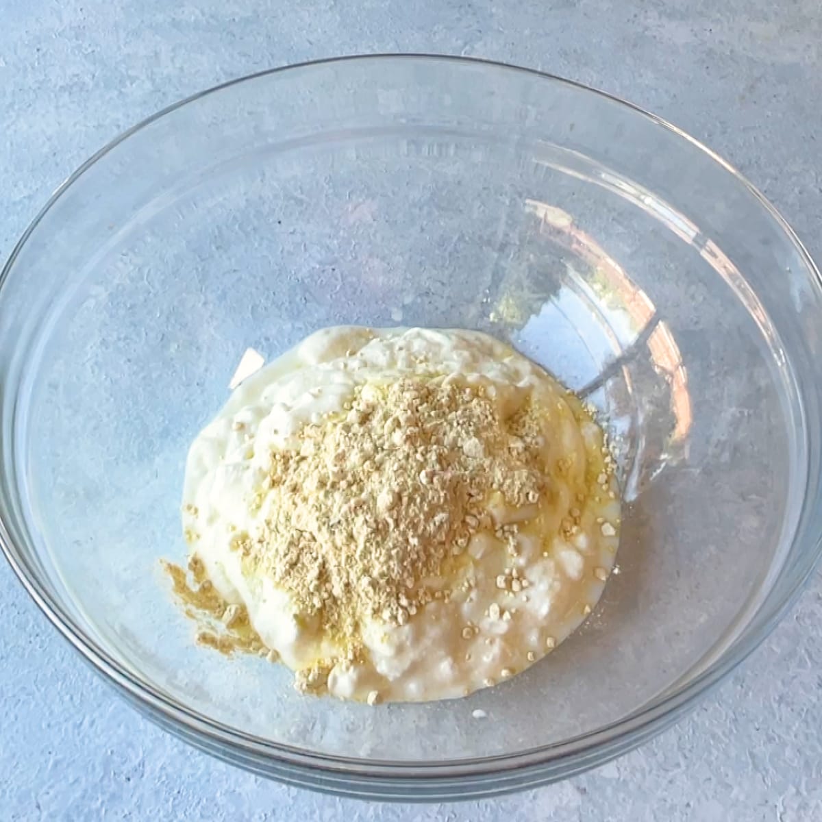 in glass bowl add Yogurt and Flour