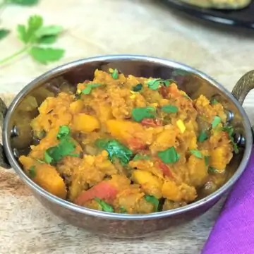 pumpkin curry garnished with cilantro