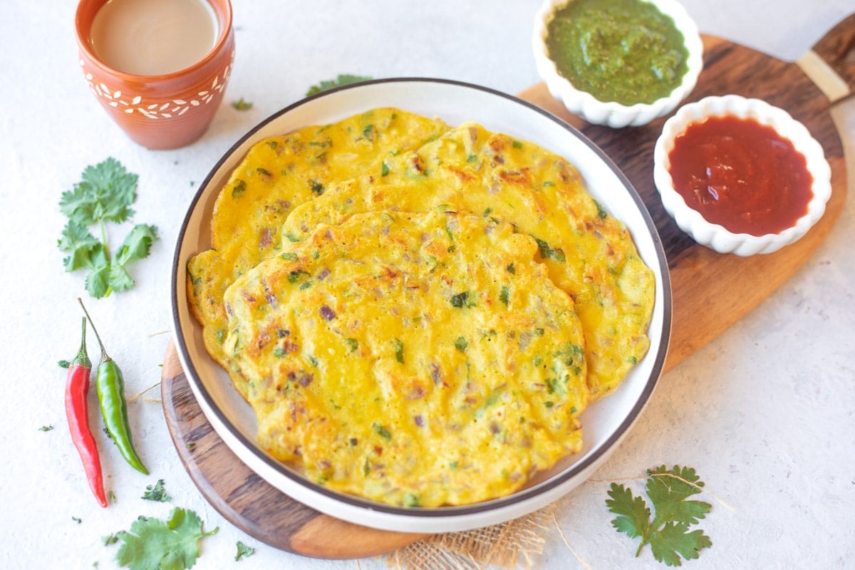 moong dal chilla with dips and tea