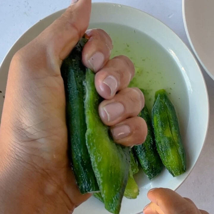 squeeze out water from karela