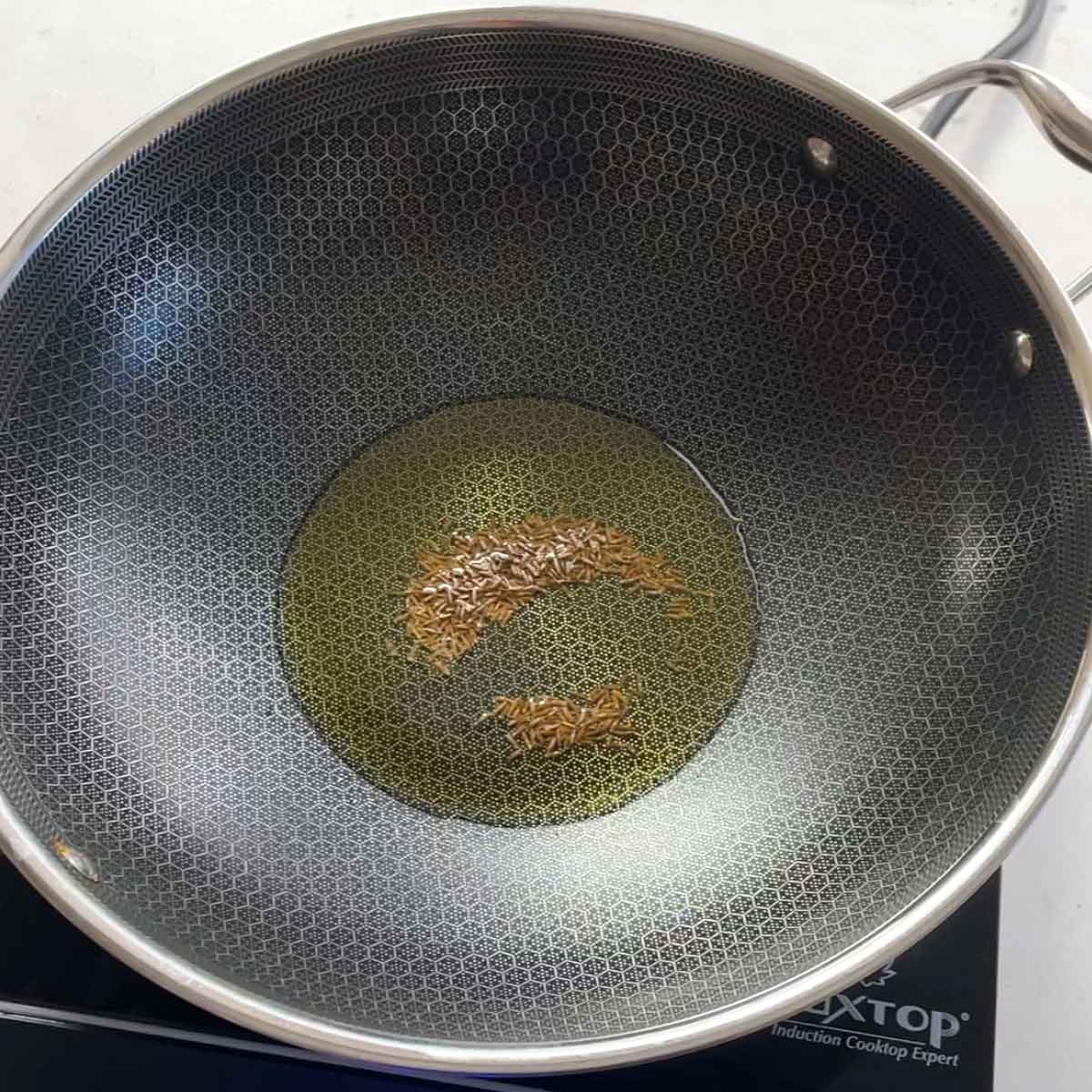 add cumin seeds to the oil