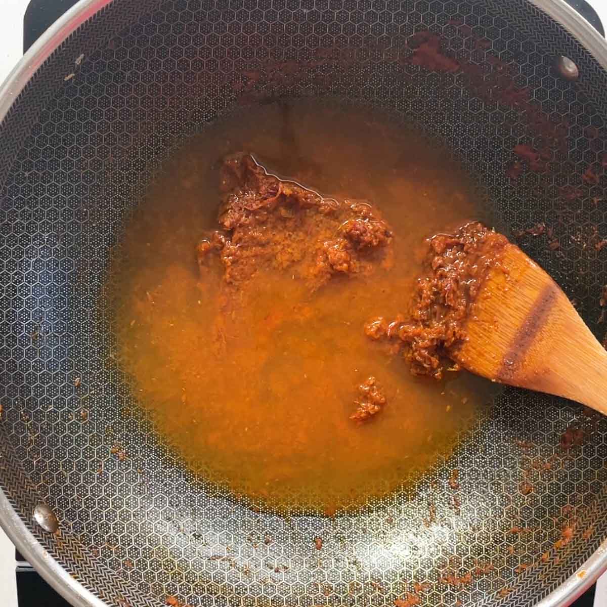 add water to the thicken masala