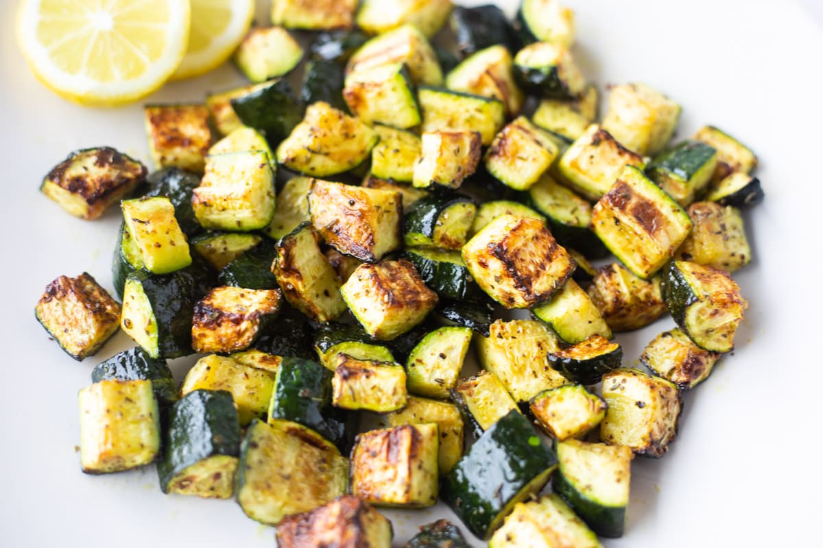Roasted Air fryer zucchini in white plate