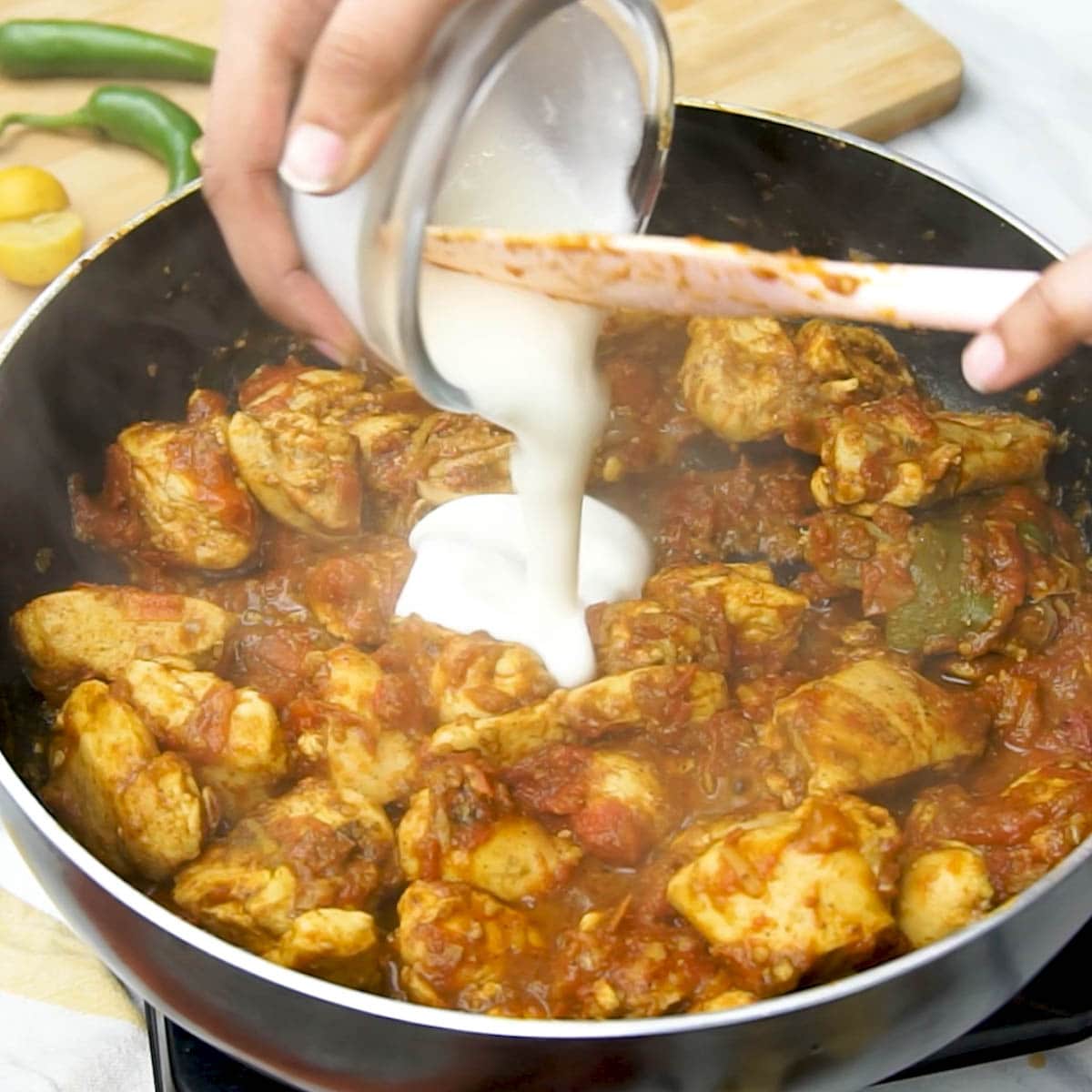 add yogurt with spatula in the curry