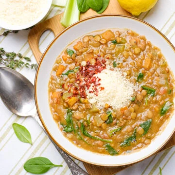 Healthy lentil soup with spoon on the side