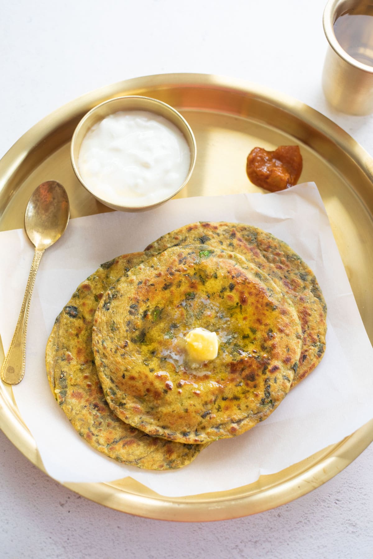 3 methi paratha in a plate