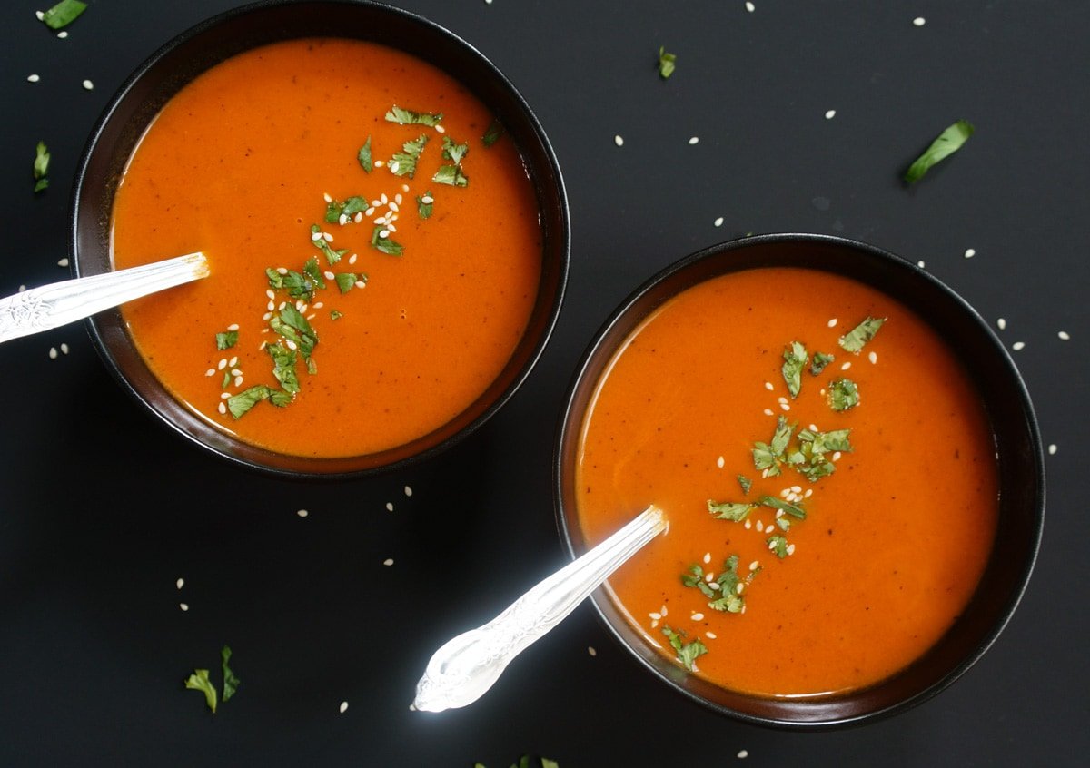 Roasted Red Pepper and Carrot Soup served in two bowls