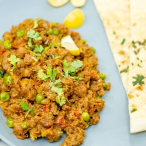 keema matar garnished with cilantro