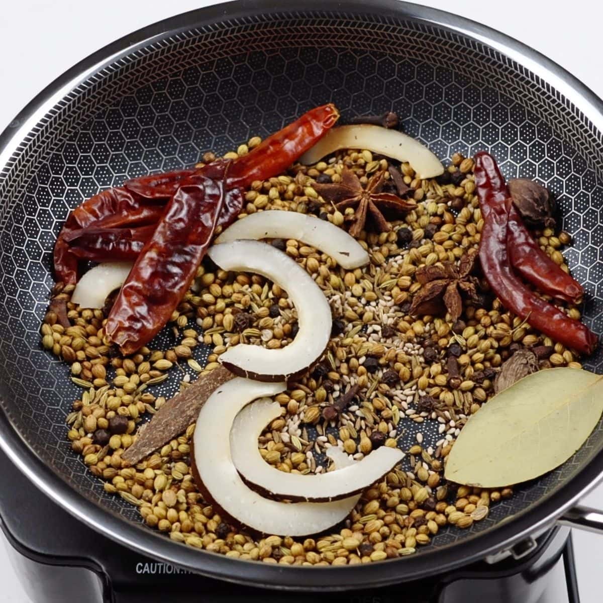 roast peanuts in a pan