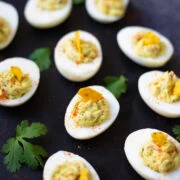 Guacamole Deviled eggs on a platter