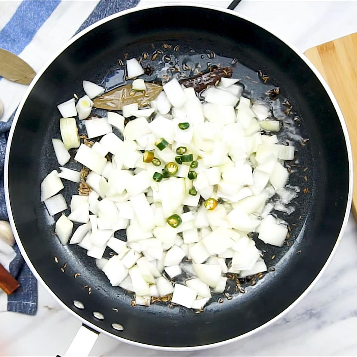 Add Green Chili to the pan