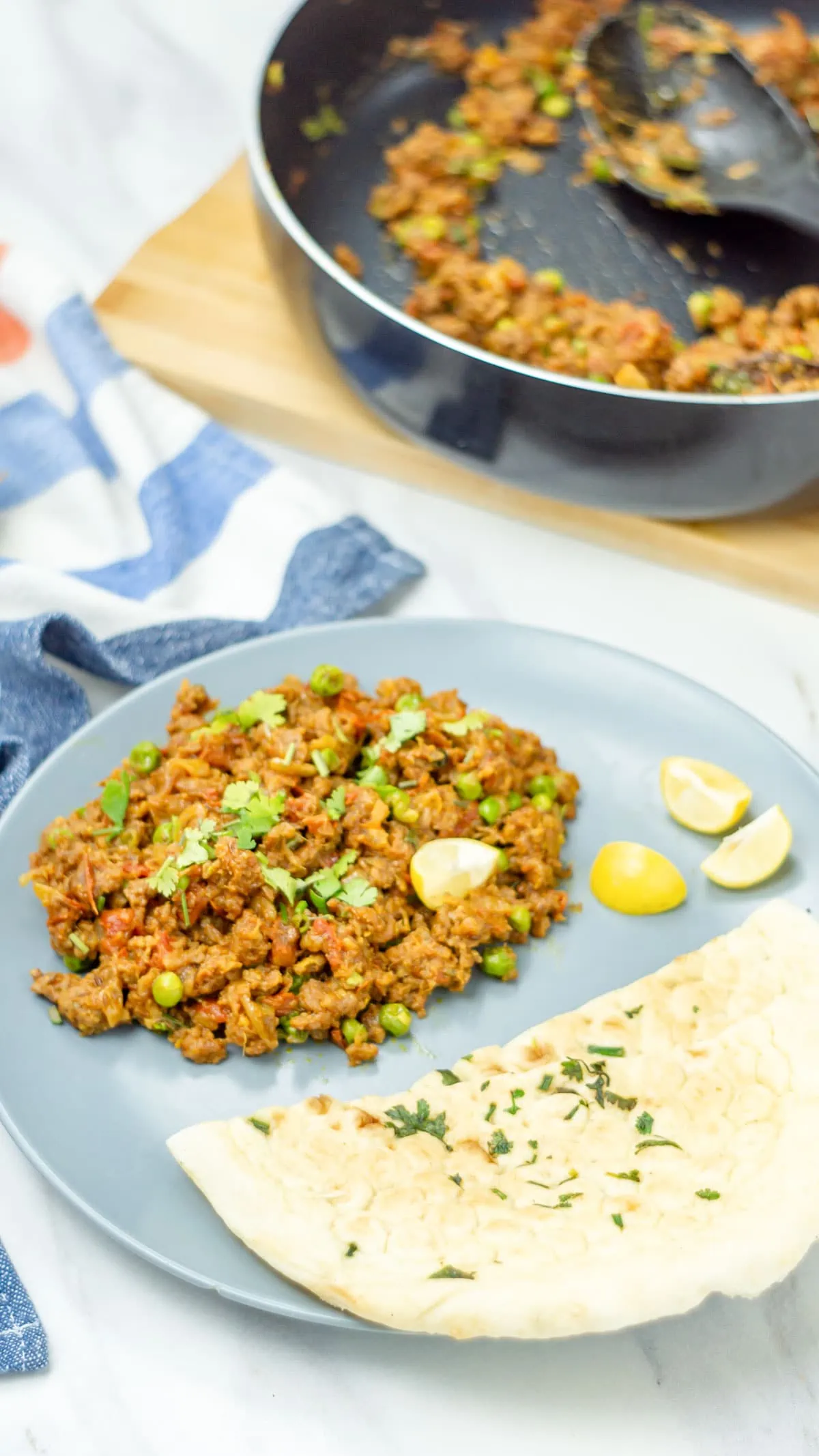 Keema Matar in a plate with naan ready to eat