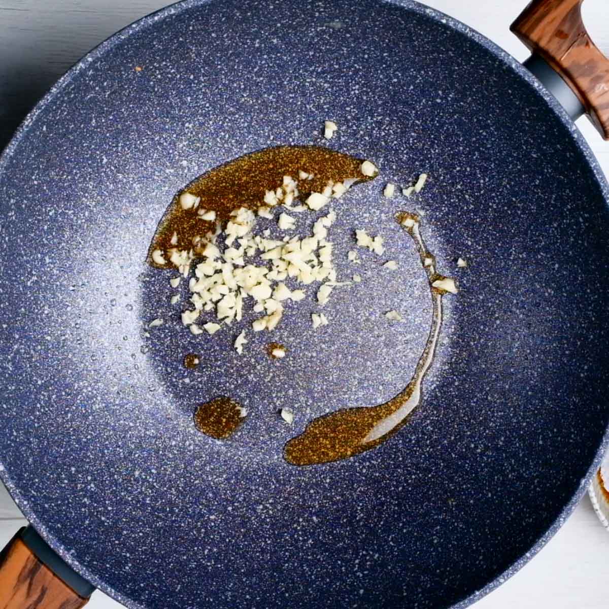 add garlic in a pan