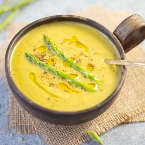 asparagus soup in a brown bowl