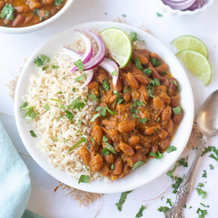 Rajma served over rice and garnished with cilantro