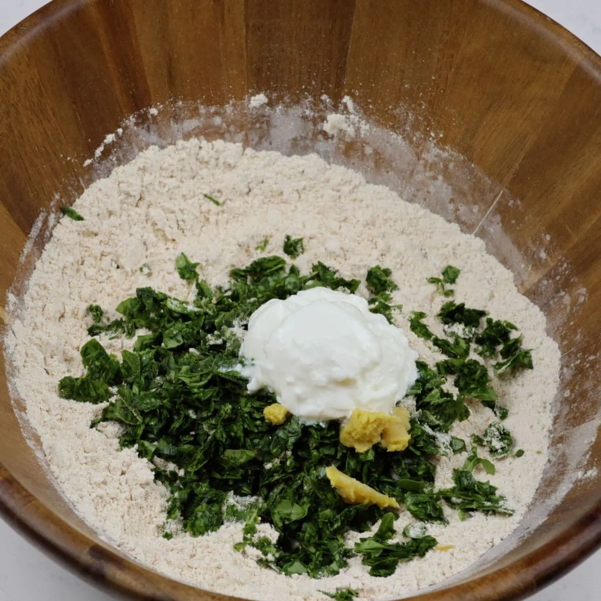 add yogurt to make soft dough