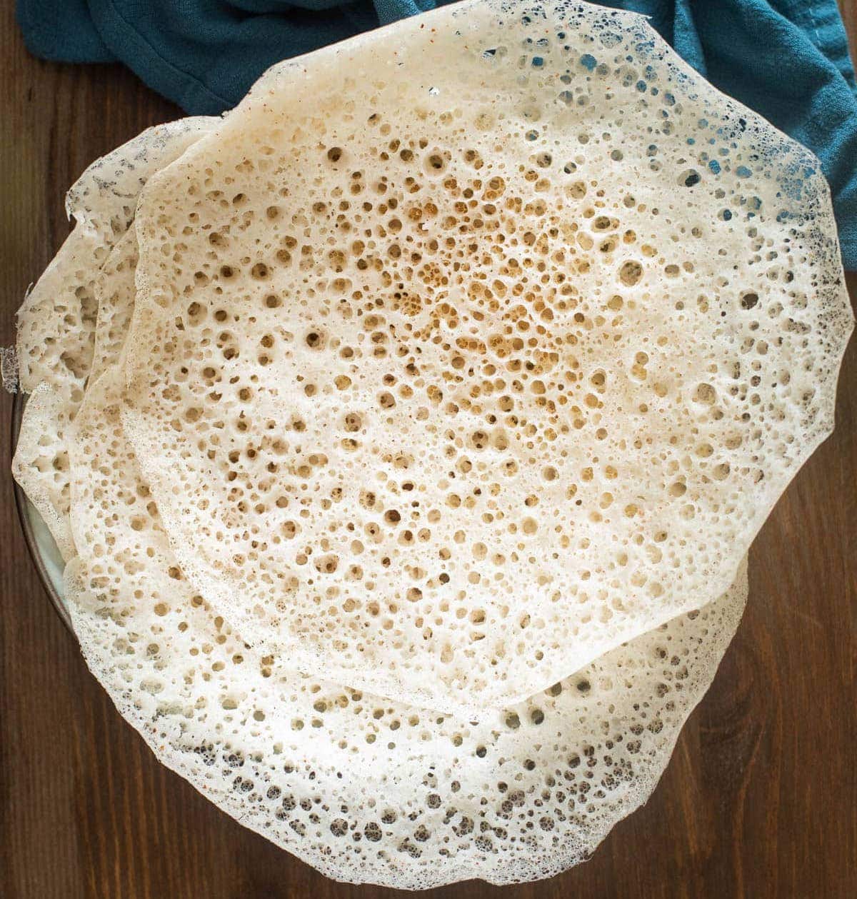 Appam south indian bread on a plate