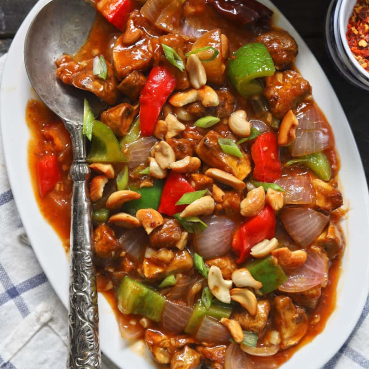 Chili Mushroom in a platter with spoon