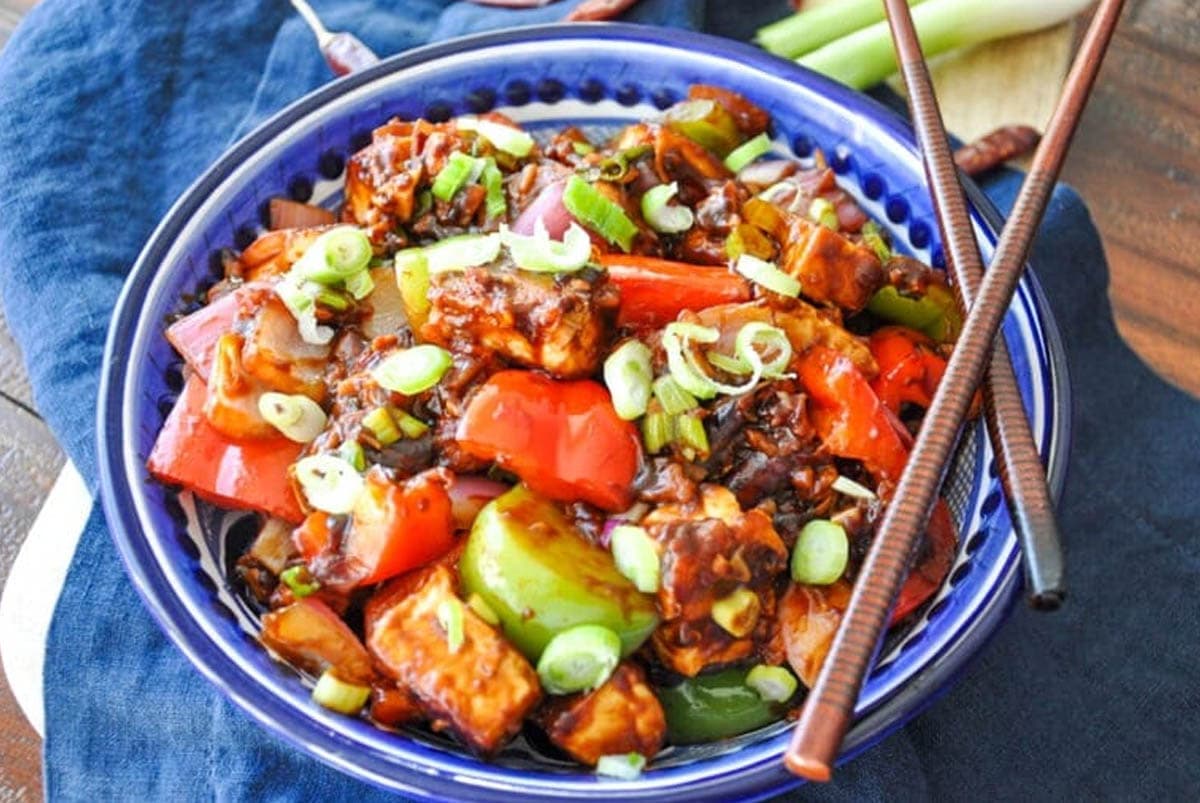 Chili tofu in a blue bowl