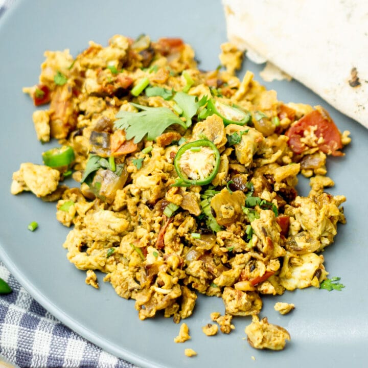 Egg bhurji served in a plate with bread