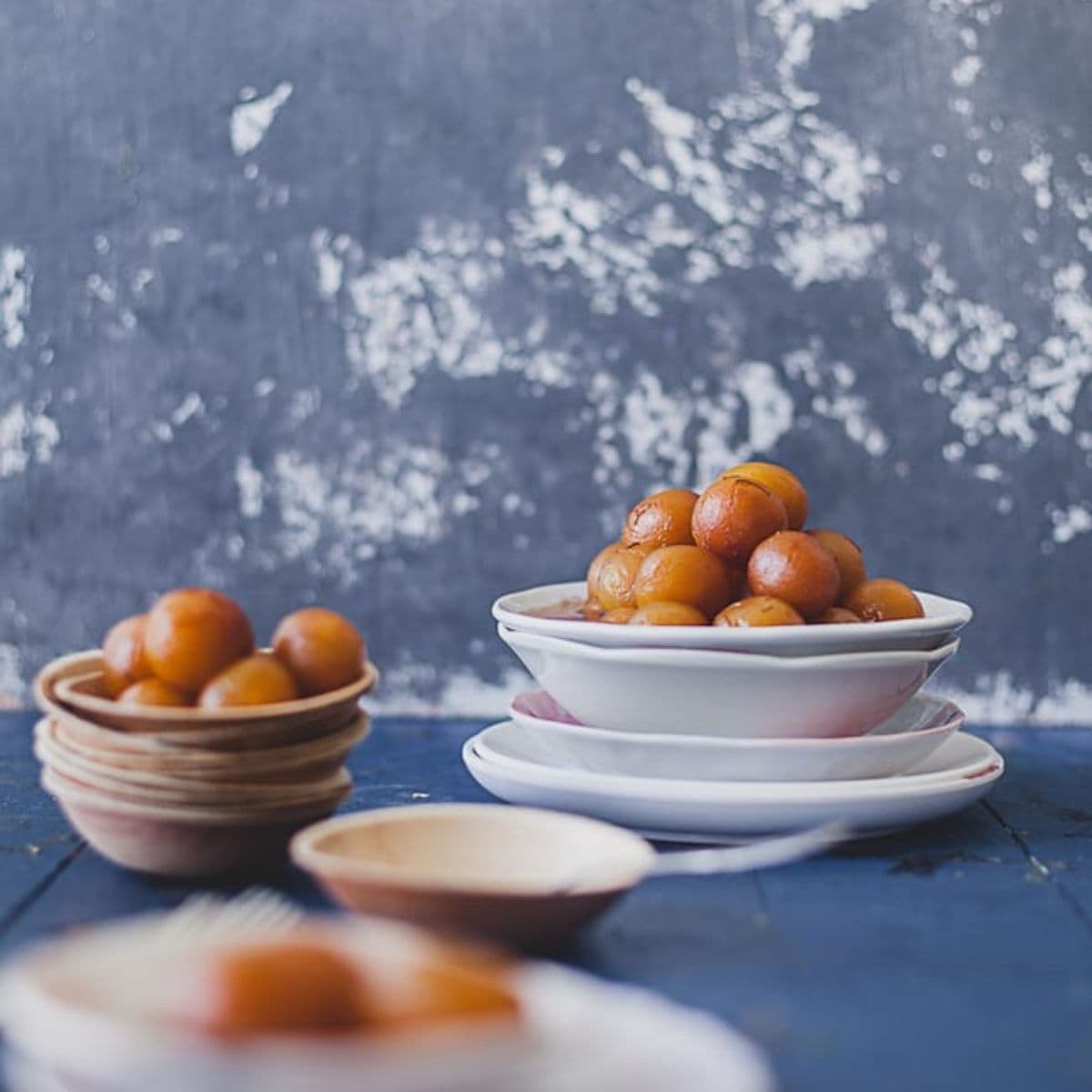 Gulab Jamun with Sweet Potatoes in a white bowl