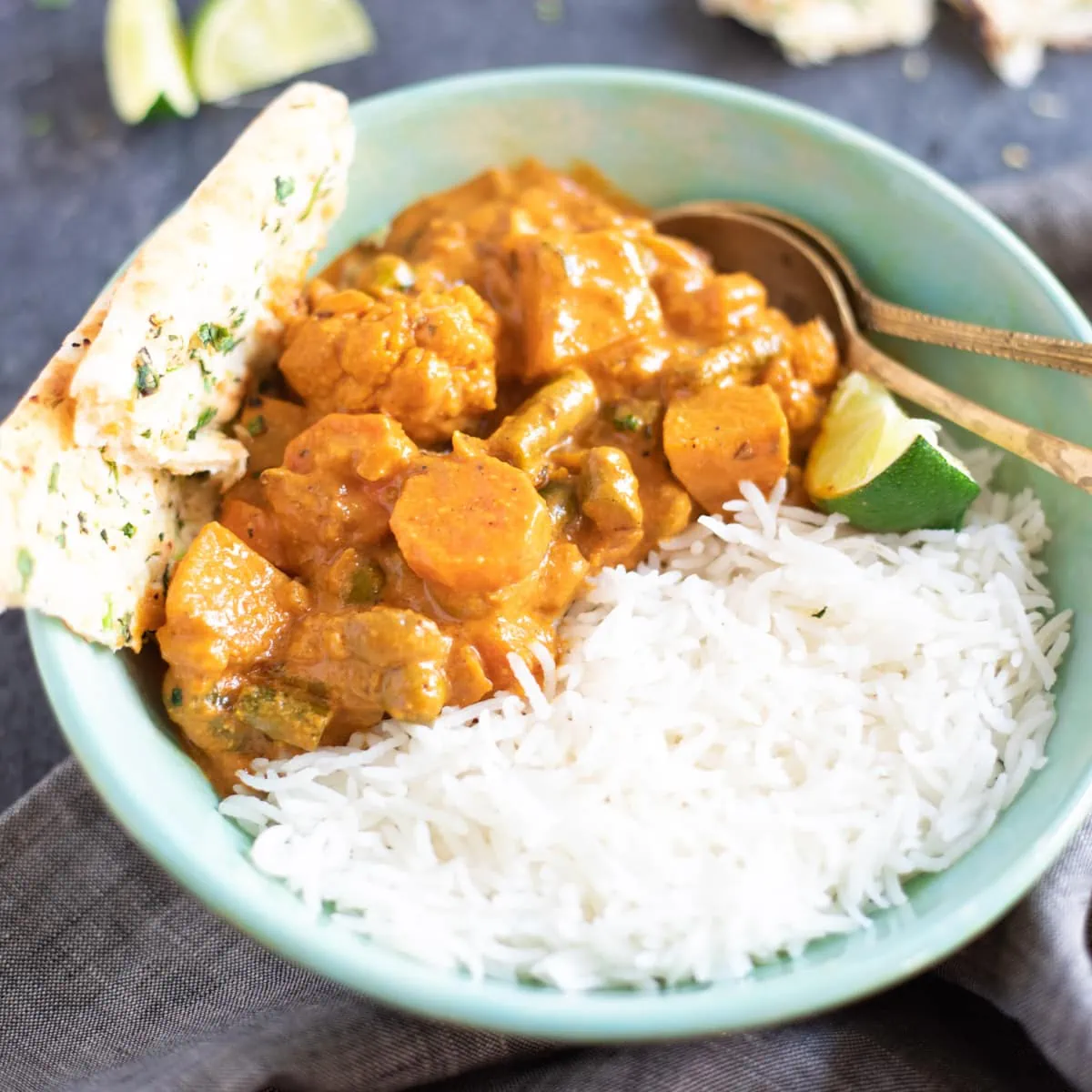 Vegetable Korma served with rice in a bowl