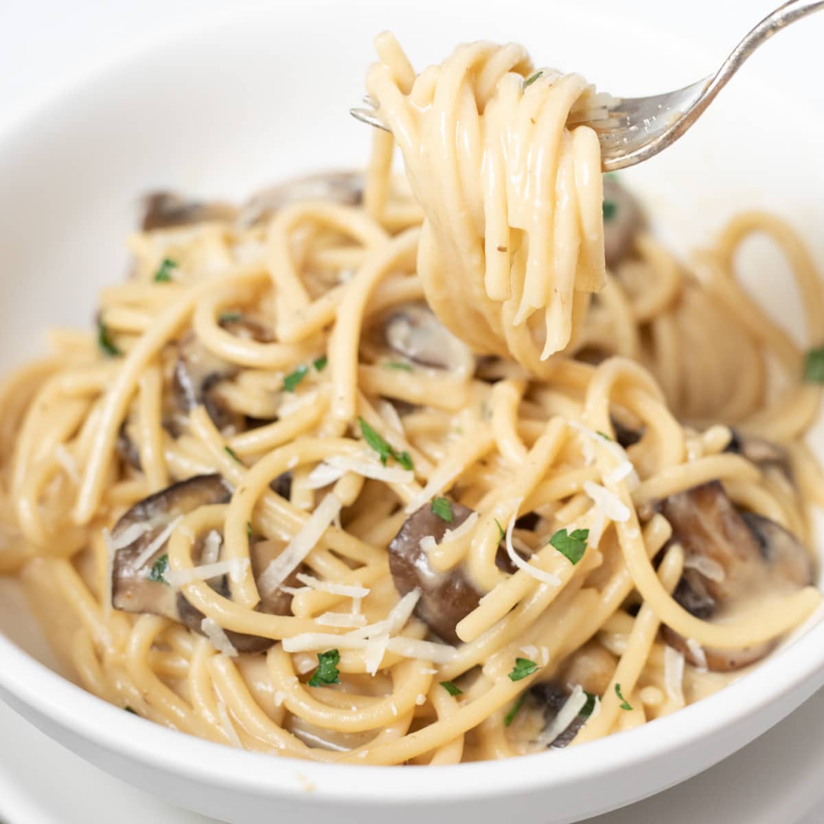 instant pot mushroom pasta in a white bowl