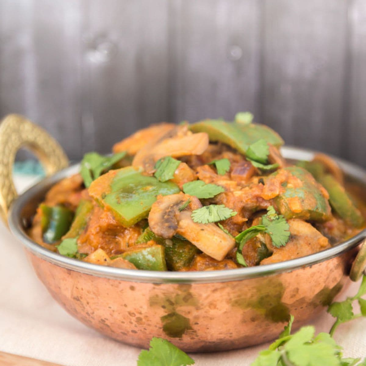 Kadai Mushroom garnished with cilantro