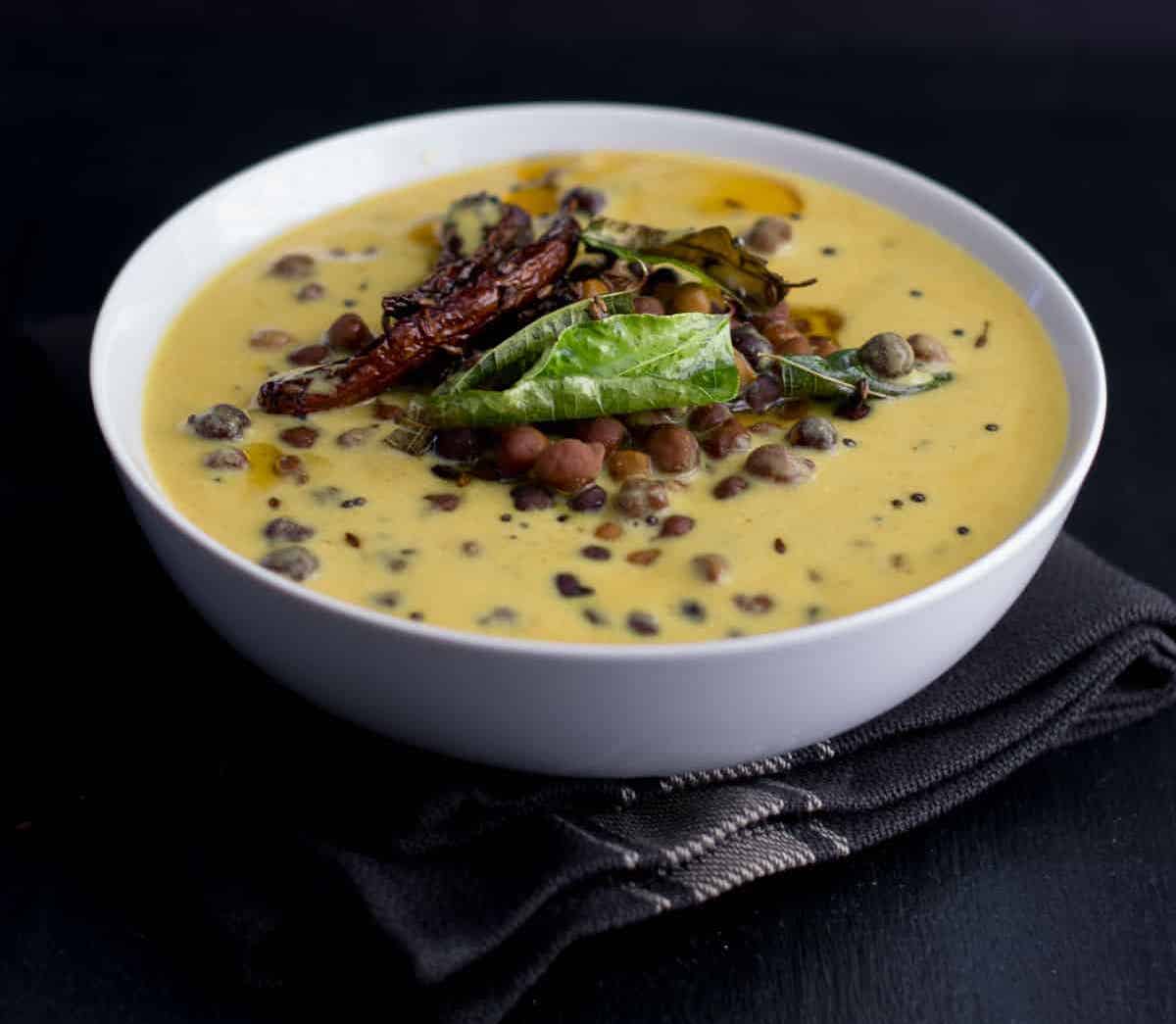 Kale Channe Ki Kadhi in a bowl