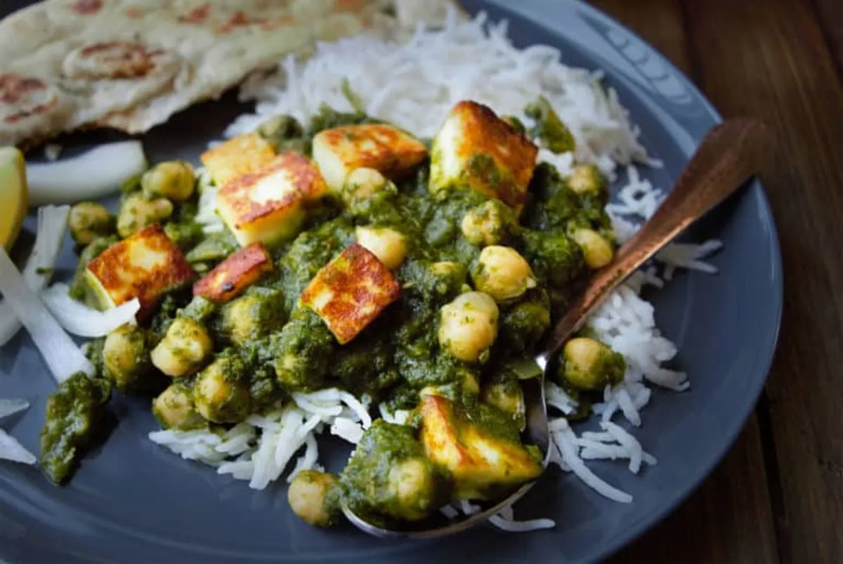 Kale Saag with tofu in a plate with rice