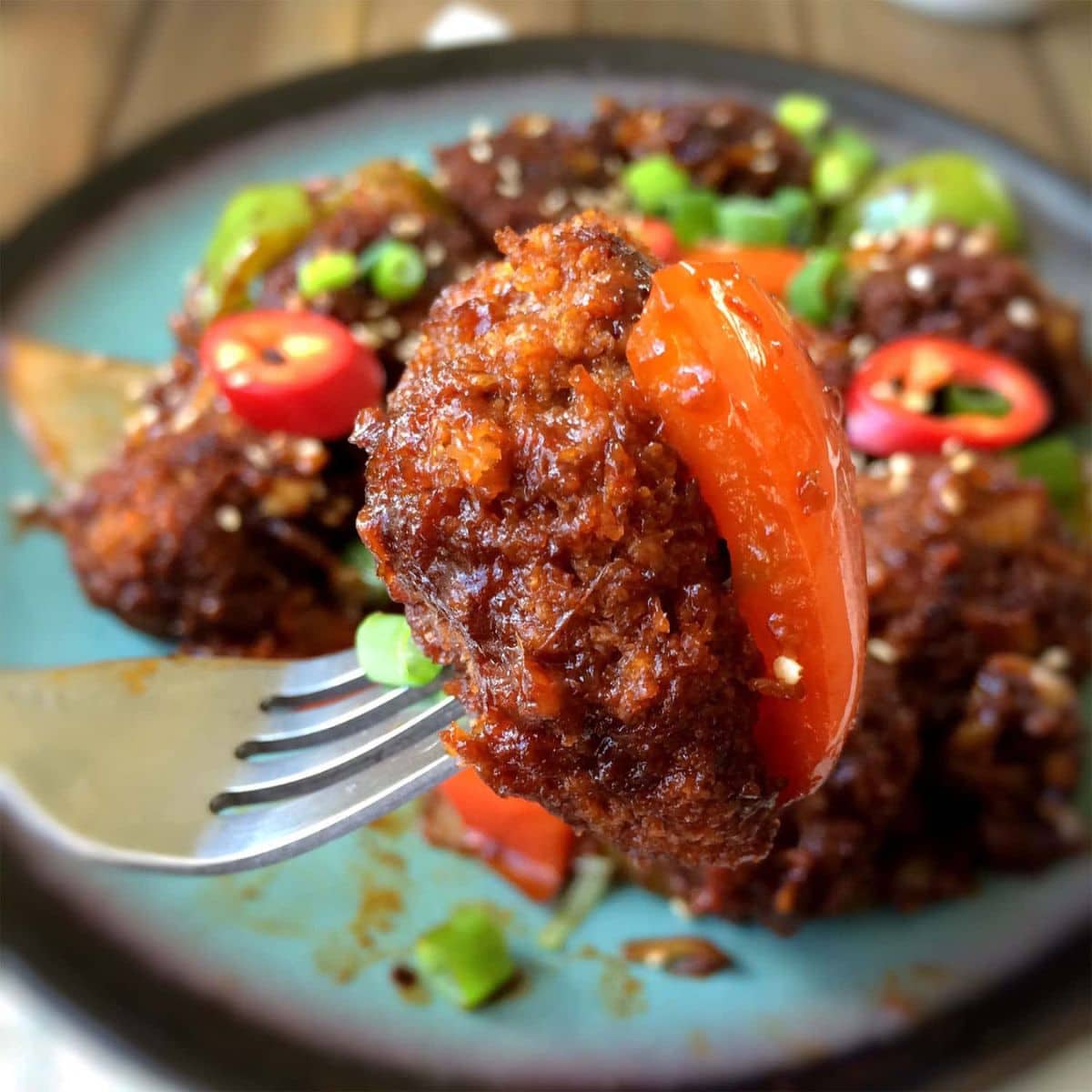 Mushroom manchurian in a fork