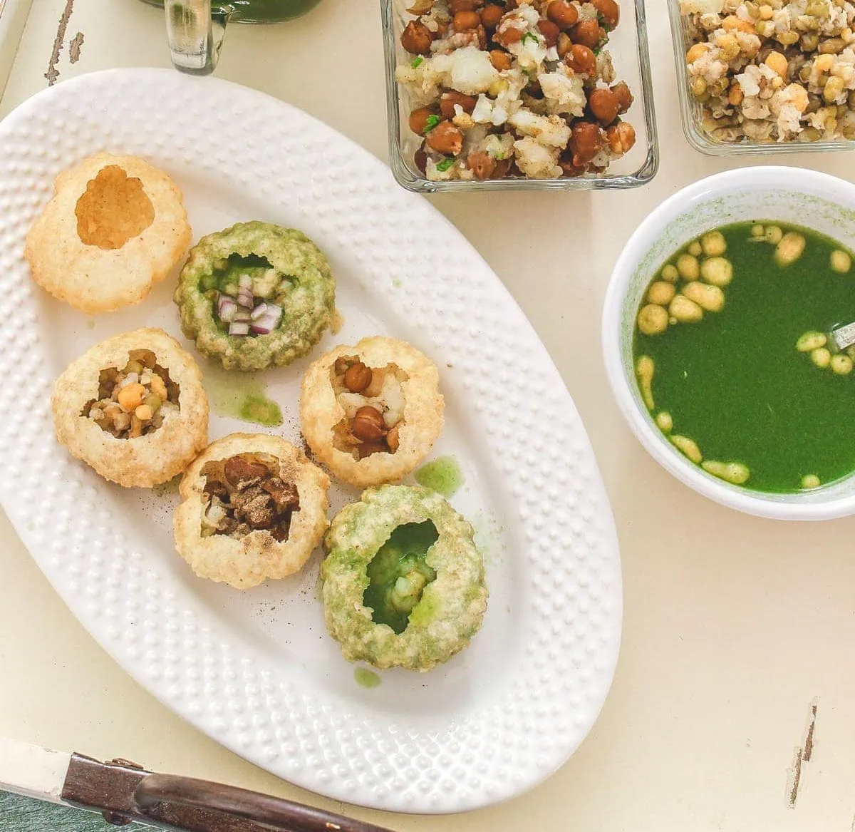 Pani Puri in a white oval plate
