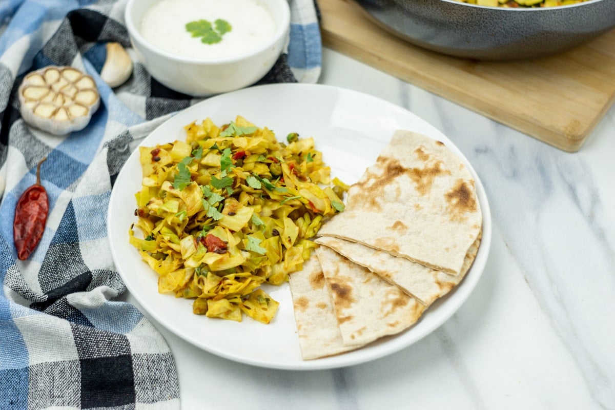 Indian cabbage stir fry with peas in a plate