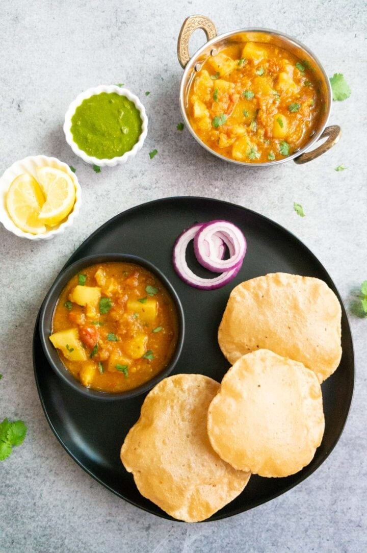 Aloo Rasedar served with poori