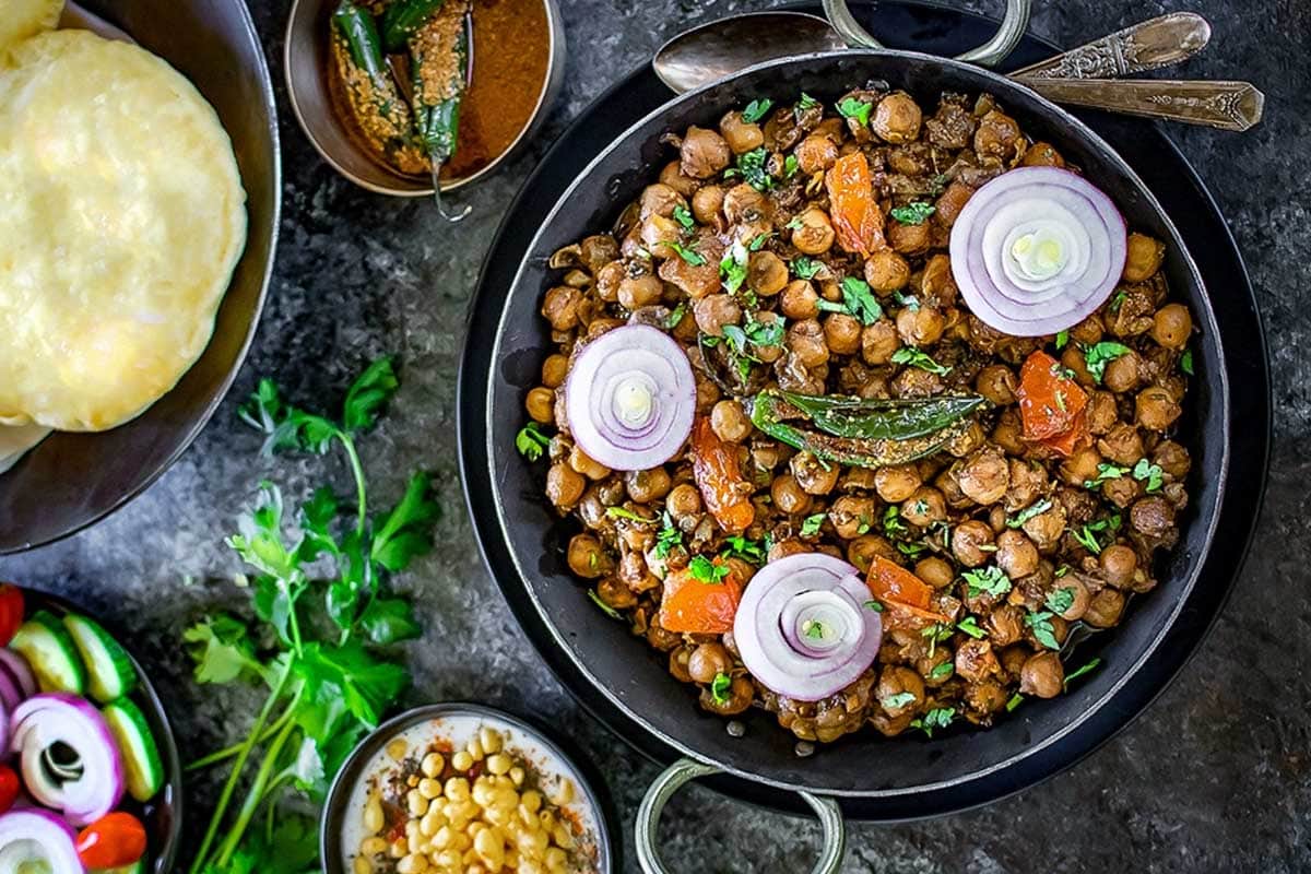 Instant Pot Pindi Chole with onion rings and chili