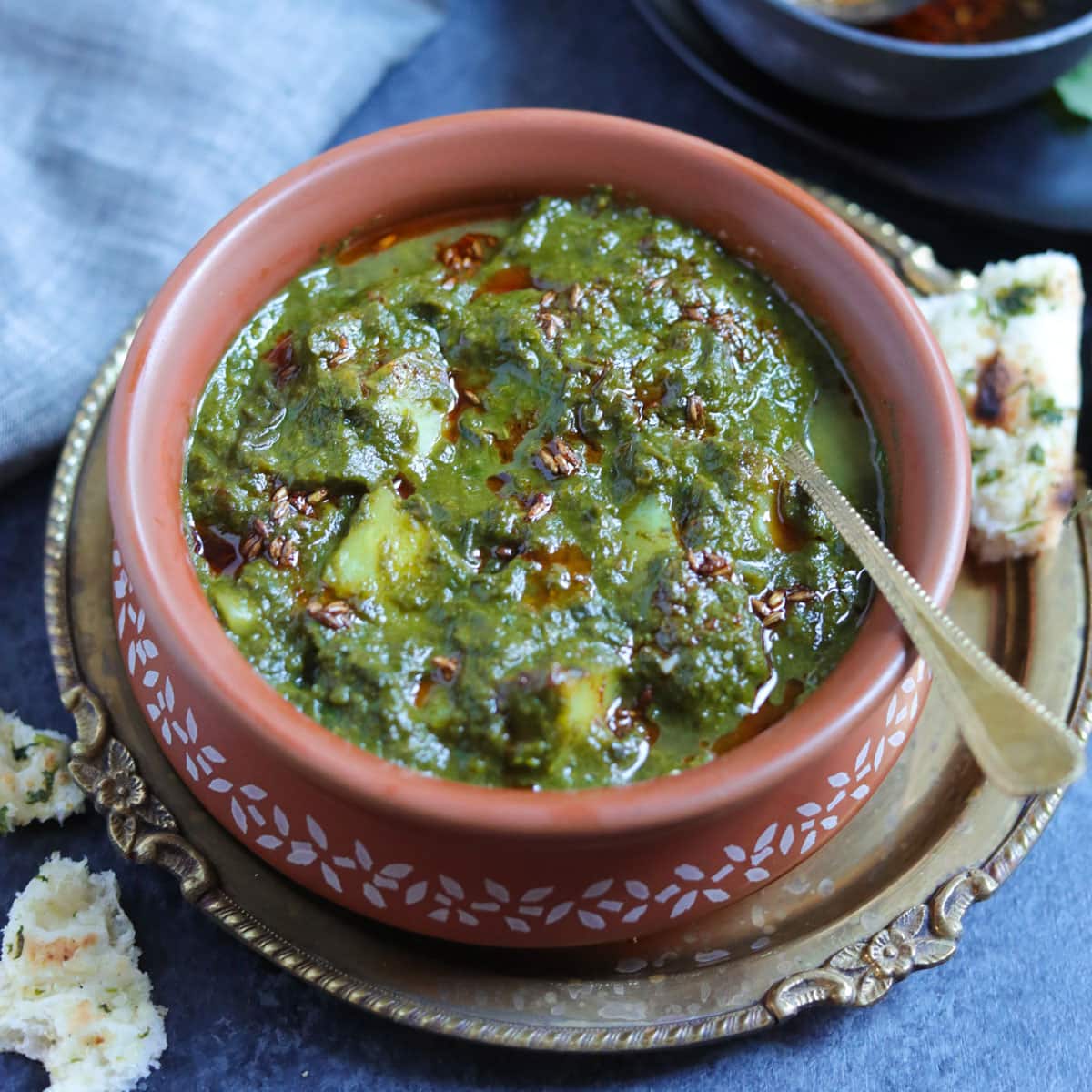Saag aloo (spinach potato curry) in a bowl